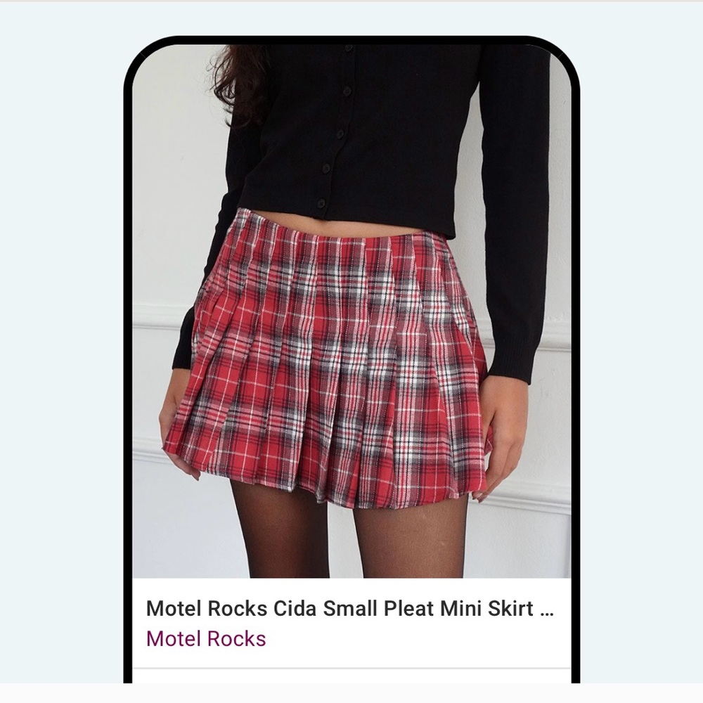 Red plaid mini skirt, new with tags. Past return window. Runs a little large.